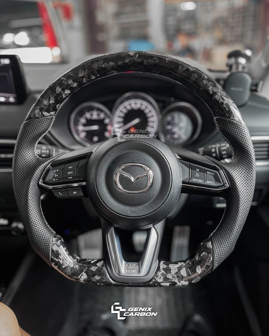 GENIX CARBON Mazda customizable forged carbon fiber steering wheel.